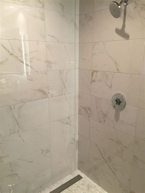 Calcutta Polished Porcelain DISCONTINUED Porcelain Tile Bathroom