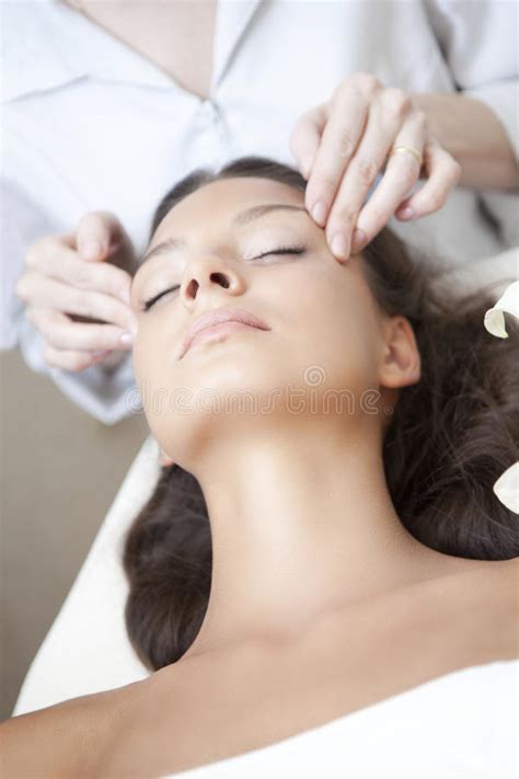 Spa Salon Young Beautiful Woman Having Various Facial Treatment Stock