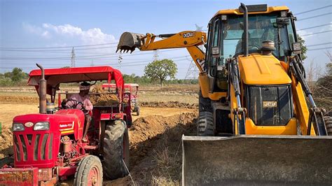 JCB 3DX Eco Xpert Loading Red Mud In Mahindra 415 DI Tractor Trolley