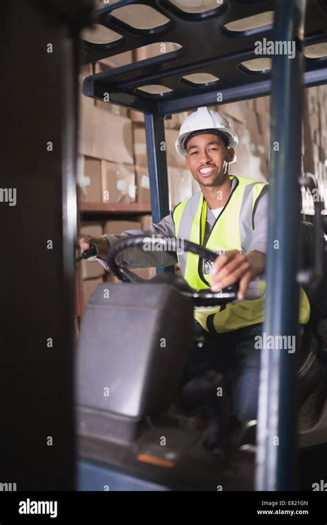 driver operating forklift machine  warehouse stock photo alamy
