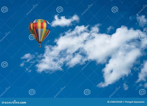 Big White Clouds On The Blue Sky Nimbostratus Clouds An Altostratus Cloud Hot Air Balloon In