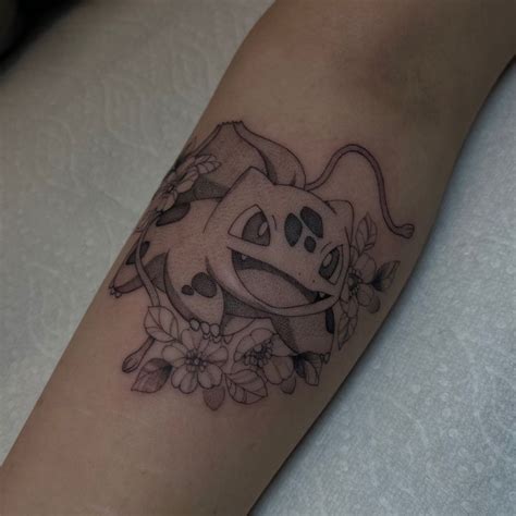 Bulbasaur Tattoo | Pokemon tattoo, Tattoos, Full neck tattoos