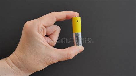 hand  holding battery recycling  power energy concept stock photo