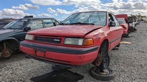 Junked Mazda Proteg