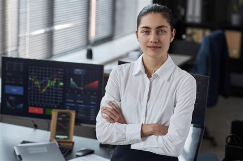 Premium Photo | Young broker working in broking office