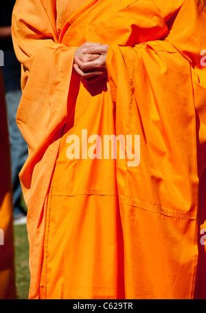 Buddhist Monk Hands Clasped Stock Photo Alamy