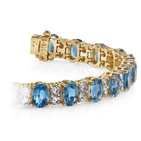 Blue Topaz Bracelet In Yellow Gold Accent Diamonds