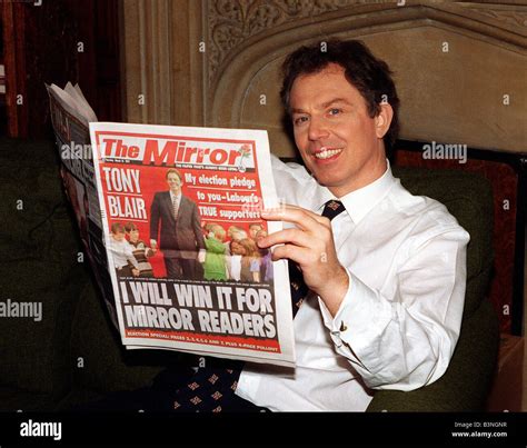 Tony Blair Mp Labour Leader Reads The Daily Mirror Newspaper At Home