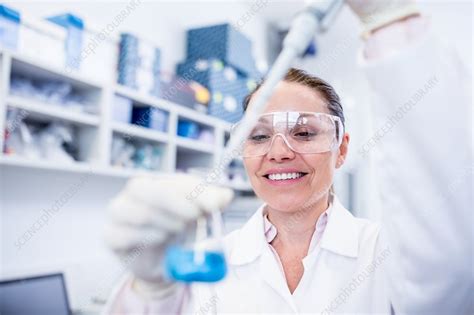 Lab Assistant Using Pipette Stock Image F020 3304 Science Photo