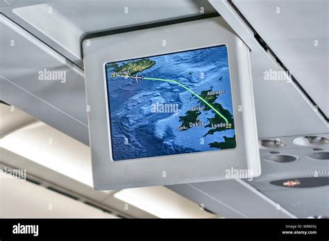 Interior of a British Airways Airbus A320 aircraft, showing a monitor ...