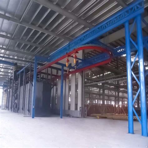 Overhead Conveyor Rail Continuous Pass Through Shot Blasting Machine