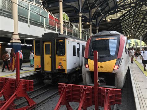 Old And New A Class 317 Unit Number 317508 Brel Electric Multiple Unit Emu Train Next To A