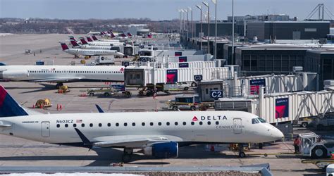 MINNEAPOLIS, MN - APRIL 5: Delta Airplanes At Airport Terminal C Of Minneapolisâ Saint Paul ...