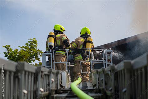 Drehleiter löscht Feuerwehr Stock Photo Adobe Stock