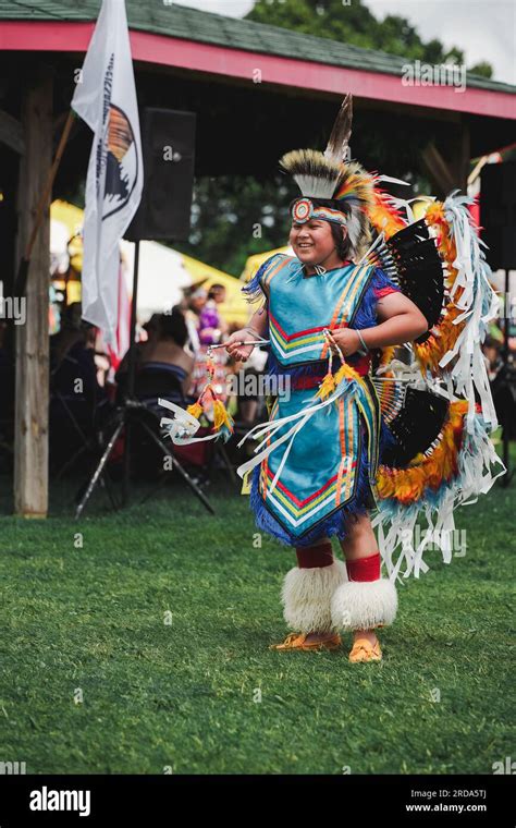 Native American Teenager Dressed In Traditional Indian Dancing Outfit