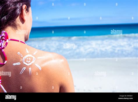Brunette With Sun Tan Lotion On Her Shoulder Stock Photo Alamy