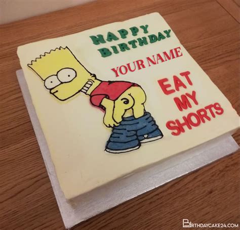 A Birthday Cake That Is Decorated With The Simpsons Character And Text