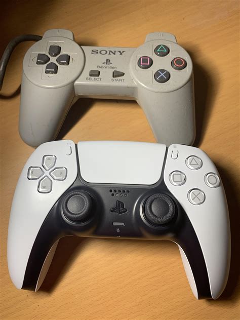 Ps1 controller next to dualsense controller : playstation