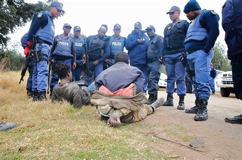 PICS Police Pounce On Zama Zama Compound In Krugersdorp During