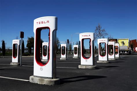Tesla's Supercharger Layoffs Under Scrutiny in J.D. Power Survey - DAX