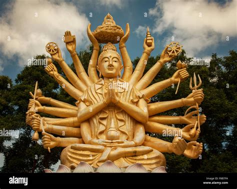 Many armed golden buddha statue hi-res stock photography and images - Alamy