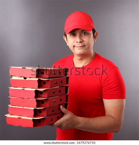 Handsome Asian Man Red Cap Giving Stock Photo 1679276710 Shutterstock