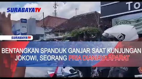 BENTANGKAN SPANDUK GANJAR SAAT KUNJUNGAN JOKOWI SEORANG PRIA DIANIAYA