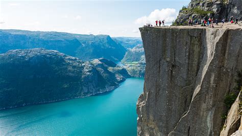 Architecture firm shares concept for boutique hotel partially hanging from 1,982-foot cliff in ...