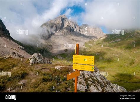 Hiking path to the 5 lakes of Forclaz with signposts, Beaufortain massif, Savoie (73), Auvergne ...