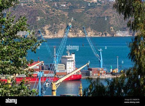 High-angle view of Skikda Port, shipping containers, oil tanker ship ...