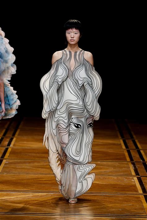 Birds And Faces Emerge From Dizzying Multi Layered Gowns By Iris Van