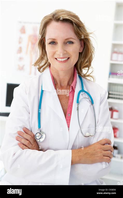 Mid Age Female Doctor Stock Photo Alamy