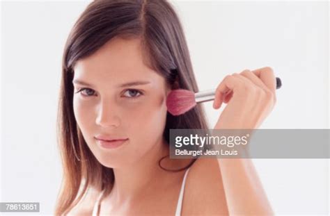 Girl Applying Makeup High Res Stock Photo Getty Images