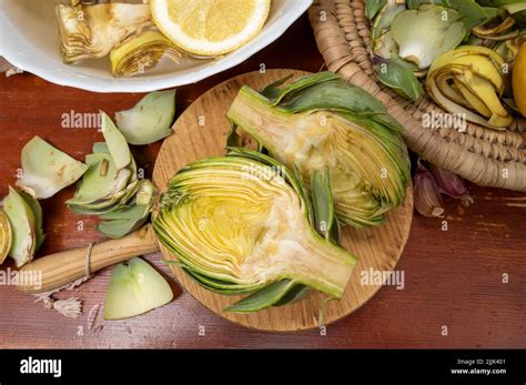 Cooking Of Green Heads Of Artichokes Plants How To Peel Raw Artichoke