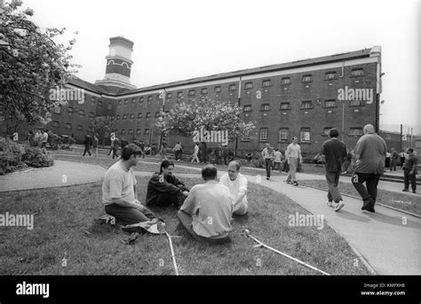 Prison inmates in exercise grounds during association, HMP Winchester ...