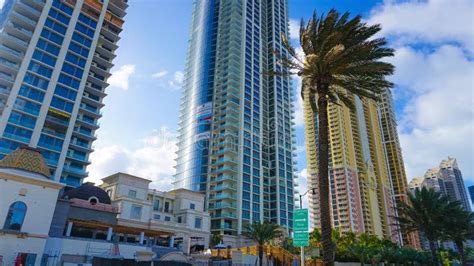 Modern Apartment Buildings With Palm Trees At Miami View From Road