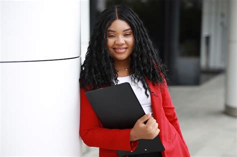 Premium Photo Portrait Of Stylish African American Woman In Red Jacket