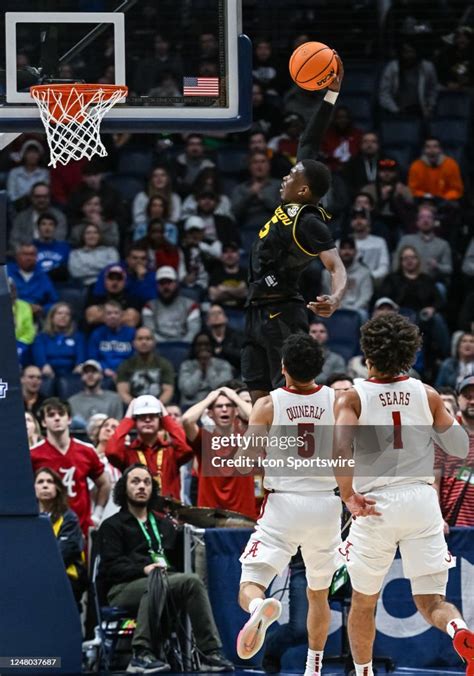 Missouri Tigers Guard Dmoi Hodge Drives For A Dunk During An Sec