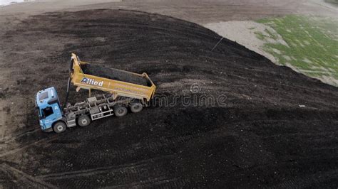 K Aerial View Of Haulage Tipper Truck Unloading Waste For Landfill