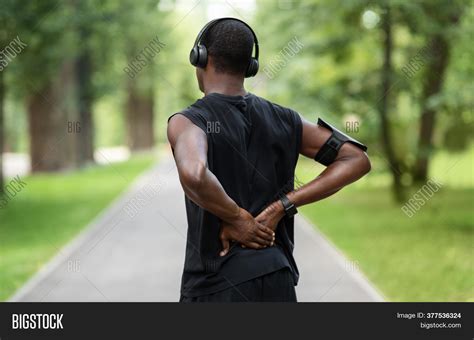 Black Man Standing Back