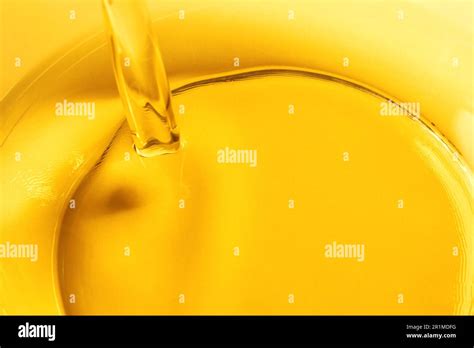 Pouring Cooking Oil Into Glass Bowl Closeup Stock Photo Alamy