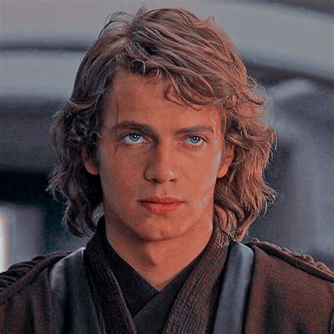 A Man With Long Hair And Blue Eyes Wearing A Star Wars Outfit Is