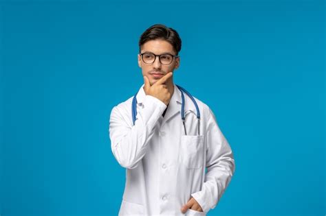 Premium Photo Doctors Day Handsome Brunette Cute Guy In Medical Gown
