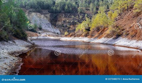 Shore of Toxic Red Lake in Open Pit of Old Copper Mine in a Forest ...