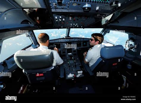 Pilot And Copilot In Cockpit Airbus A Stock Photo Alamy