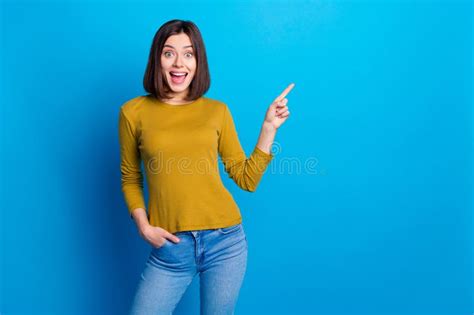 Photo Of Positive Impressed Lady Dressed Shirt Pointing Finger Empty Space Isolated Blue Color