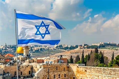 Premium Photo | Flag of israel with jerusalem in the background