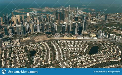 Aerial View of Luxury Villas, Dubai Marina Skyscrapers and the Palm ...