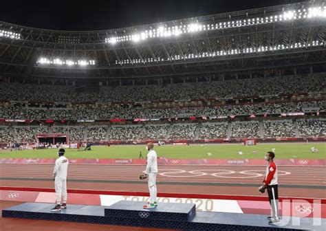 Photo: Men's 100m medal ceremony at the 2020 Olympics in Tokyo, Japan - OLY20210802463 - UPI.com