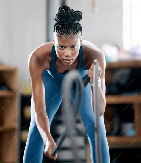 Premium Photo | Fitness battle ropes or strong black woman training for